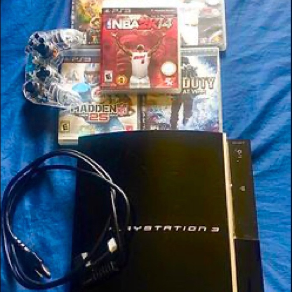 Ps3 with power cord, five games, one controller.